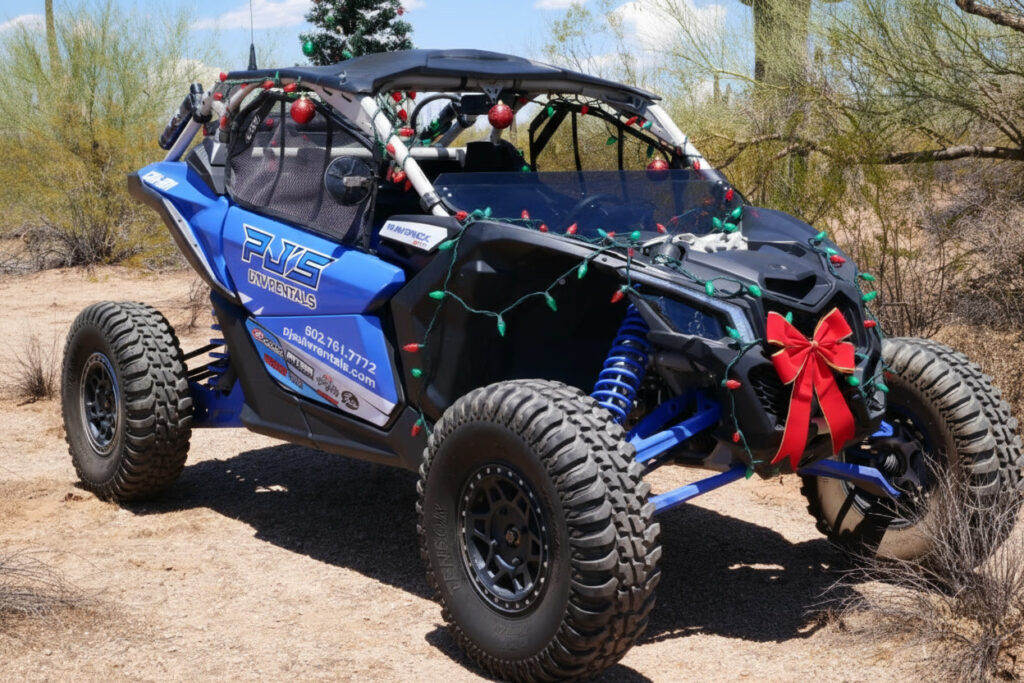 Best things to do in Arizona for Thanksgiving, Christmas and New Years, a UTV decorated with Christmas lights. PJS UTV rentals in Scottsdale. 